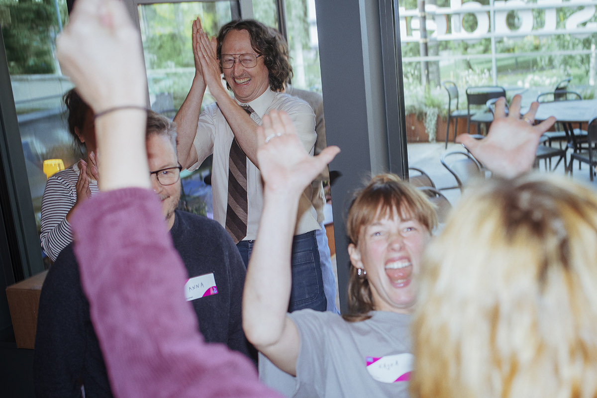 Hands in the air at a participatory day
