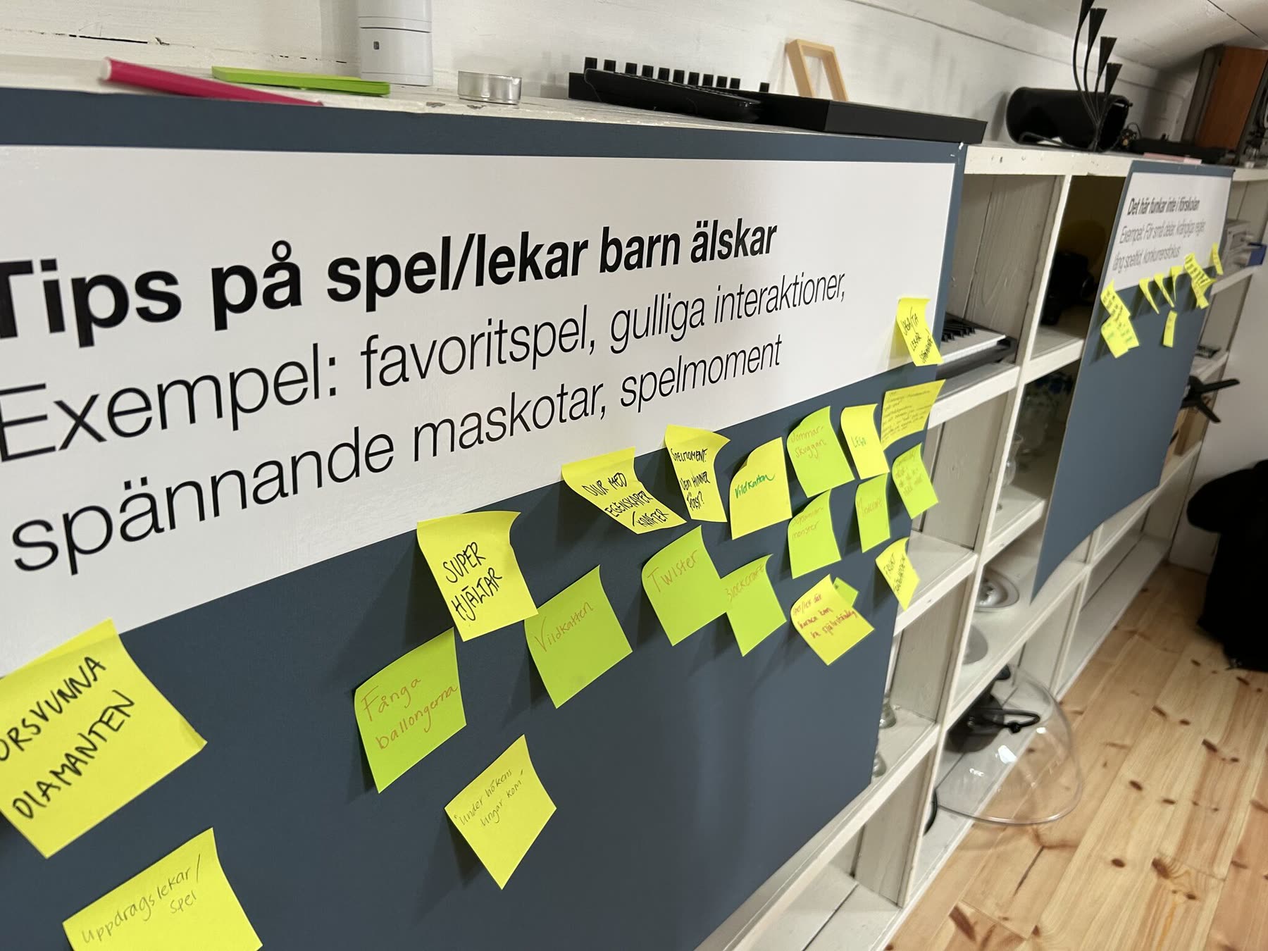 A wall of sticky notes under the heading: games children love