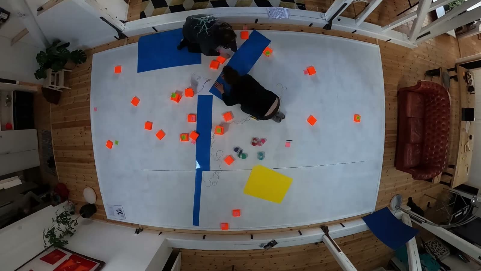 The river laid out in blue tape across the floor